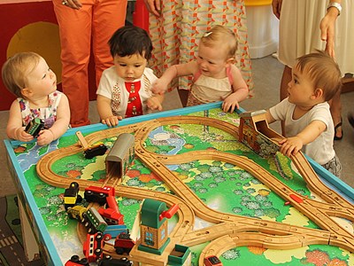 Babies with train set